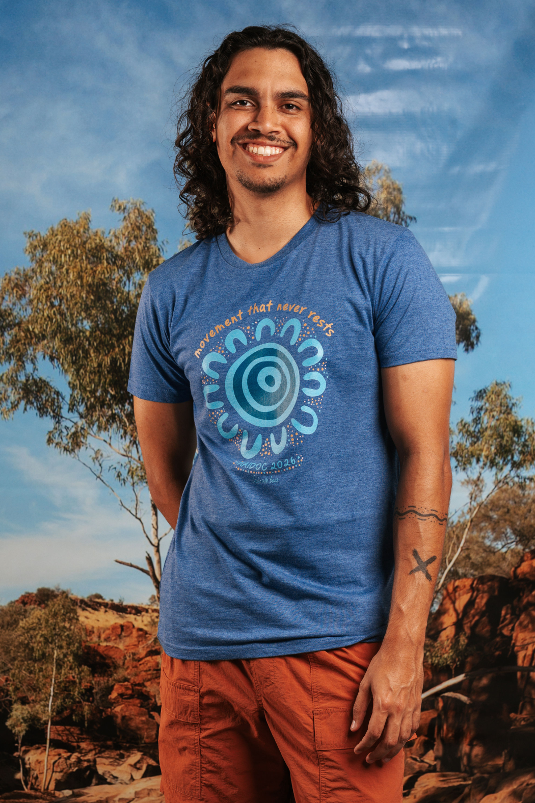 Movement That Never Rests NAIDOC Week 2026 Ocean Marle Cotton Everyday Unisex T-Shirt
