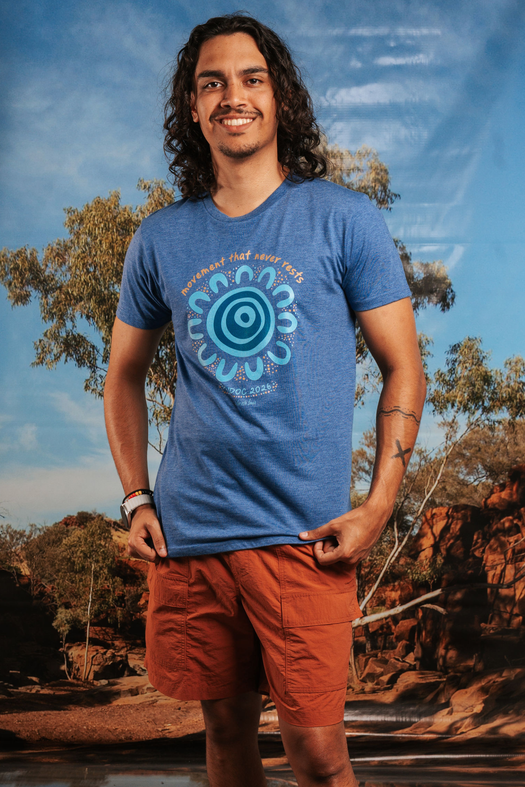 Movement That Never Rests NAIDOC Week 2026 Ocean Marle Cotton Everyday Unisex T-Shirt