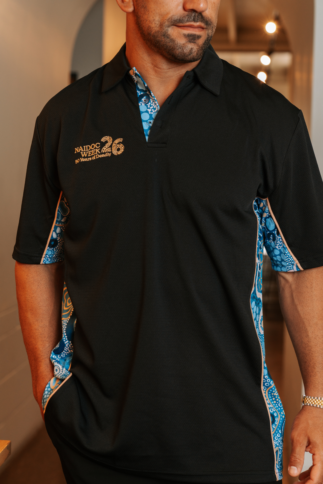 Moorditj Koorliny (Strong Journey) NAIDOC 2026 Bamboo (Simpson) Unisex Polo Shirt