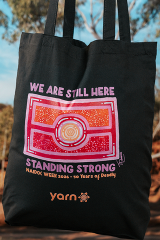We Are Still Here NAIDOC Week 2026 Tote Bag Black Long Handle Cotton Tote Bag