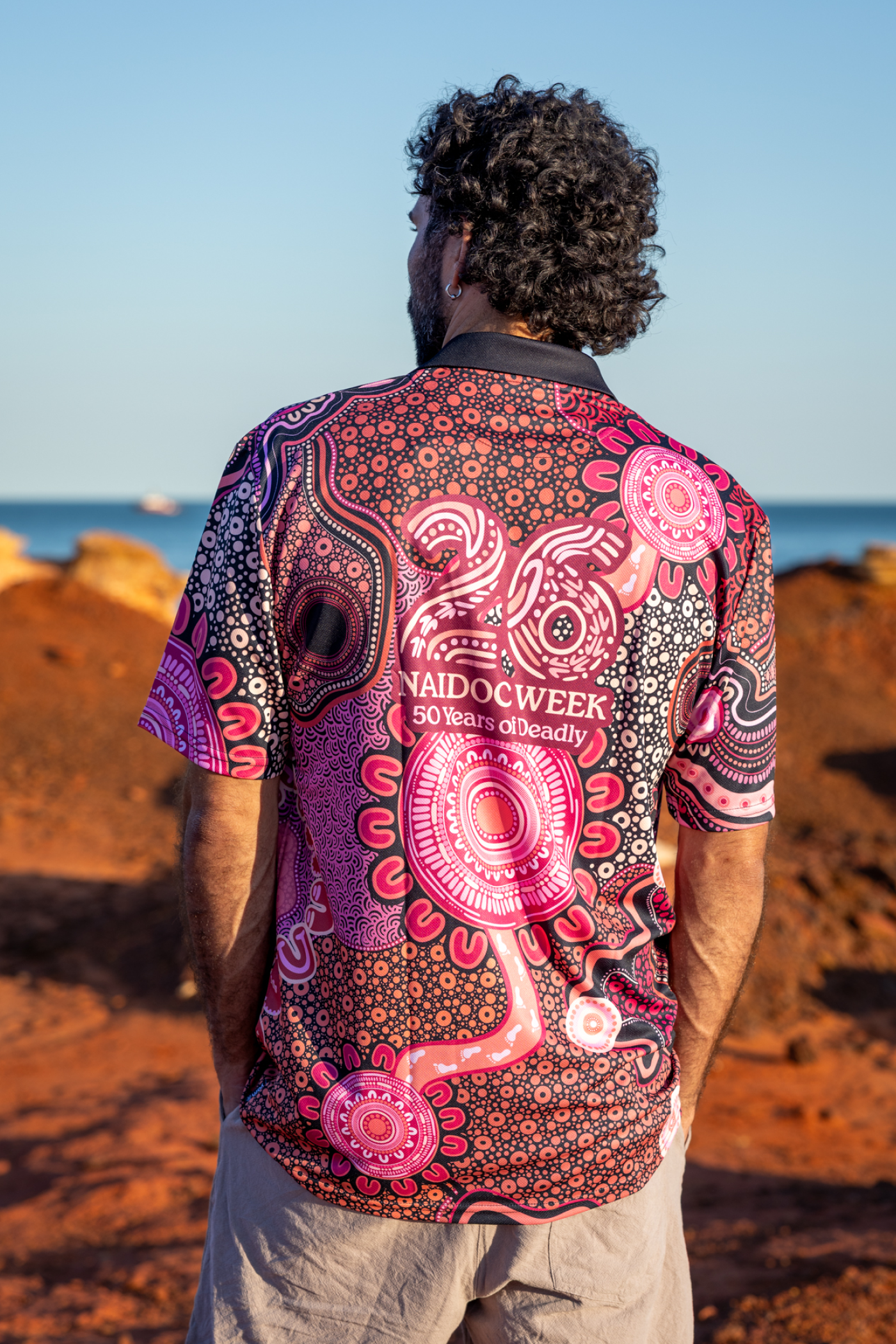 Celebration Through Generations NAIDOC 2026 Unisex Polo Shirt
