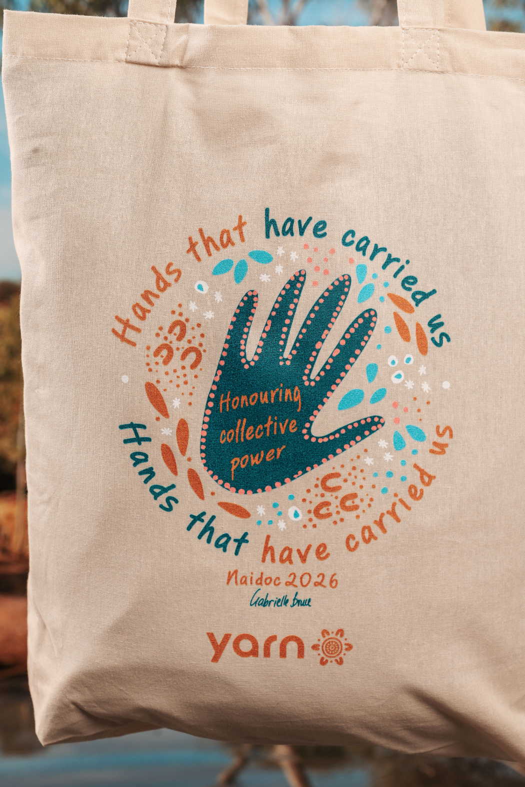Hands That Have Carried Us NAIDOC Week 2026 Tote Bag Khaki Long Handle Cotton Tote Bag