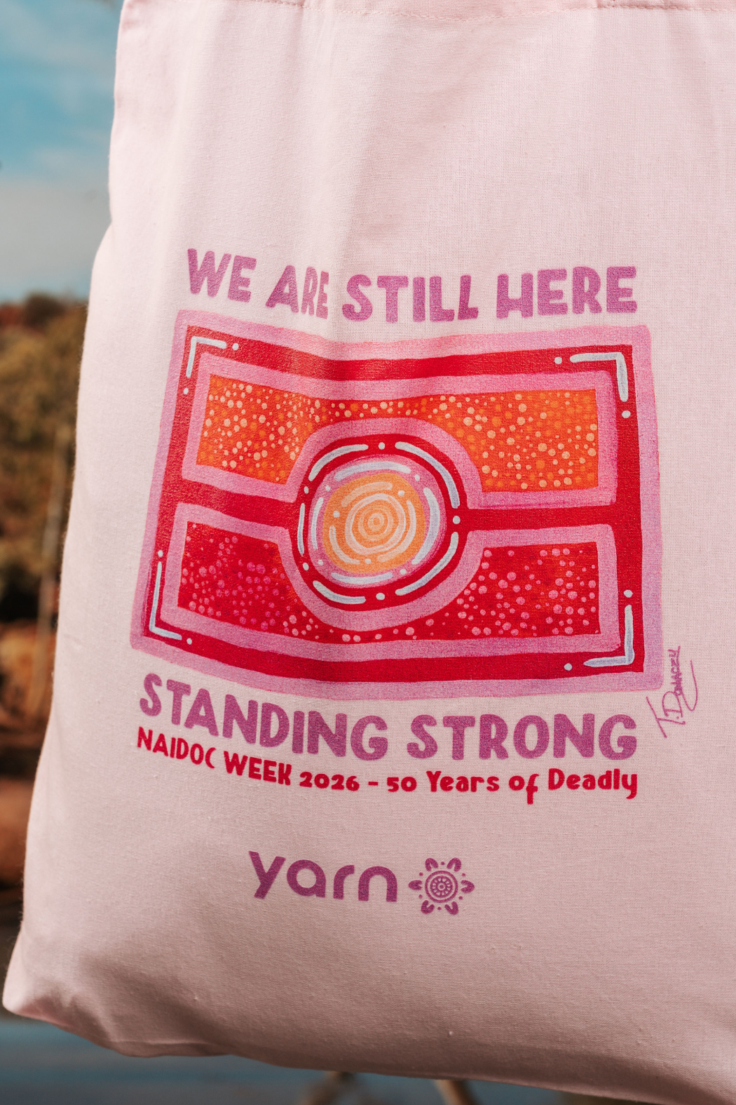 We Are Still Here NAIDOC Week 2026 Tote Bag Pink Long Handle Cotton Tote Bag